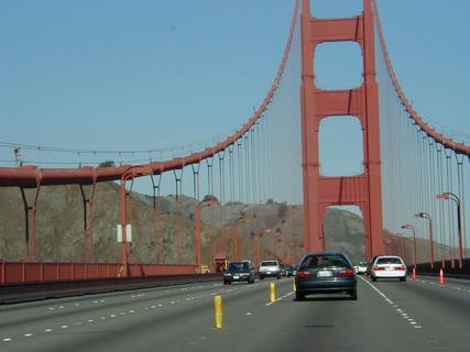 Golden Gate Bridge from our car<br>Location: <a href="https://www.google.com/maps/search/?api=1&query=37.82274,-122.47878" target="_new">Golden Gate Bridge</a>